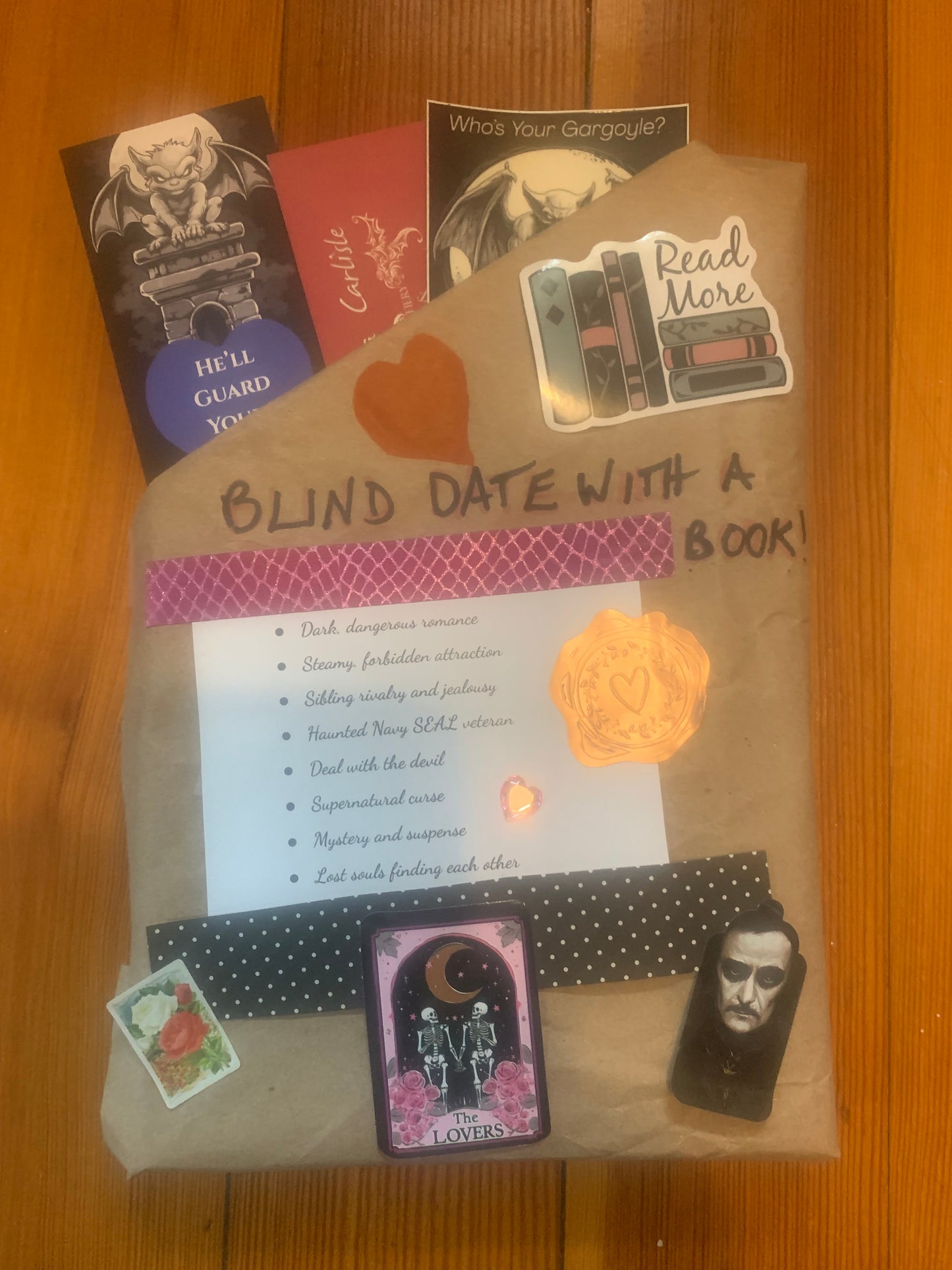 Packaged book titled 'A Blind Date with a Book' on a wooden surface