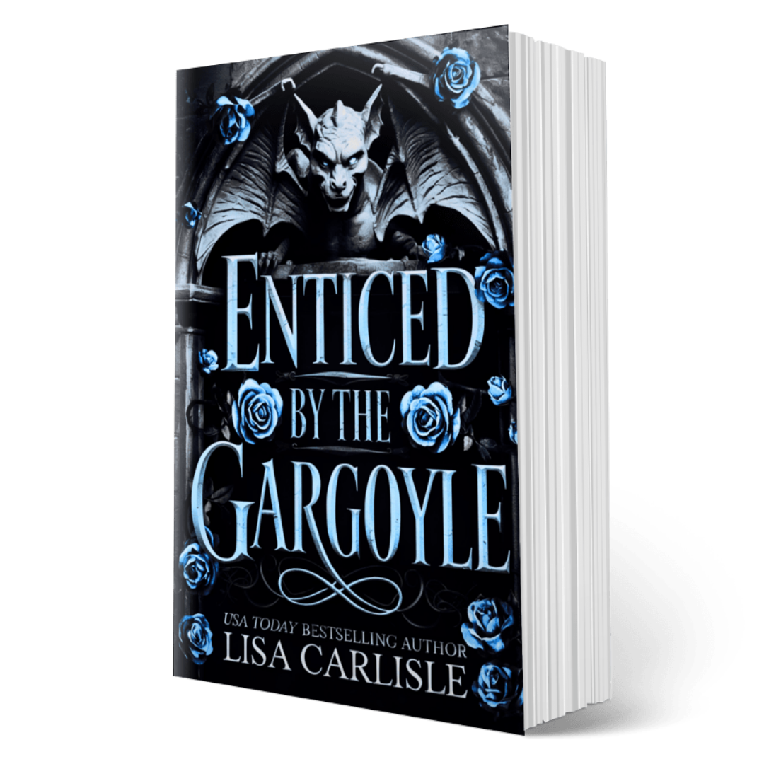 Book titled 'Enticed by the Gargoyle' with a gargoyle and roses on the cover, authored by Lisa Carlisle.