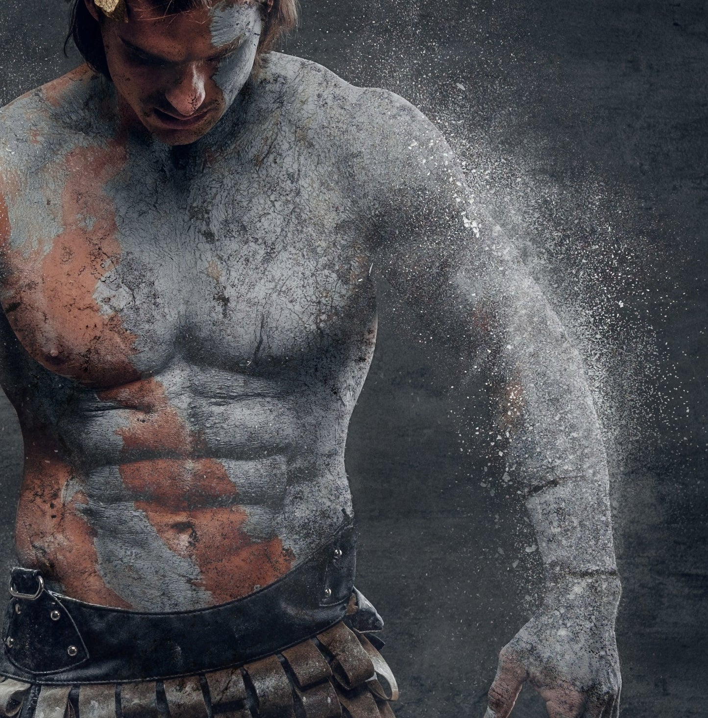 man breaking from stone